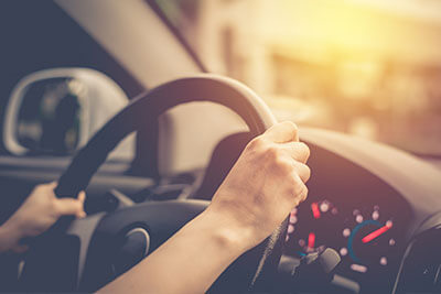 Hands on a steering wheel | Auto Insurance
